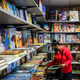A patron browses in the children’s book section at Frugal Bookstore in Boston in November 2020. Frugal Bookstore, the only Black-owned bookshop in Boston, received an outpouring of support amid nationwide protests against racism and police brutality.